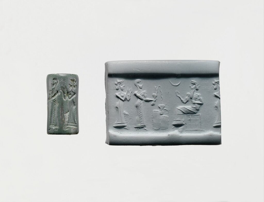 Small stone cylinder seal beside a clay impression showing a worshipper before a seated god