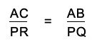 Two similar triangles with equal angles marked at each corresponding vertex